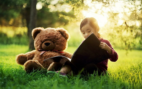 A girl role-playing with its Fluffy Kids' Toys in a park